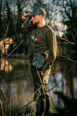 Bolso bandolera Trakker NXC Essentials - Tienda Carpfishing